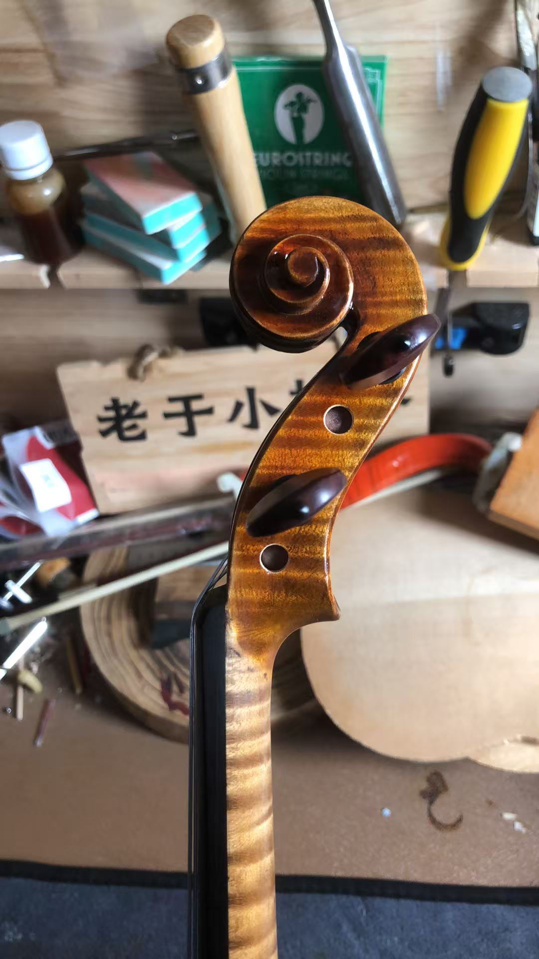 Setup work on a finished violin