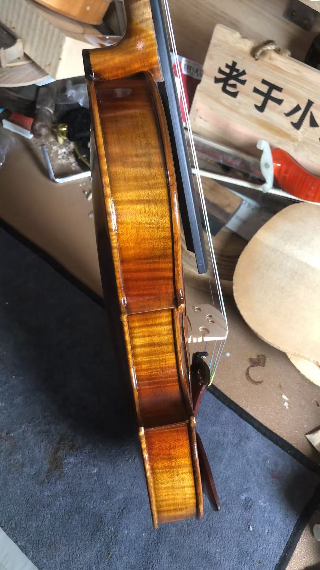 Violin making at our bench in Taixing, China