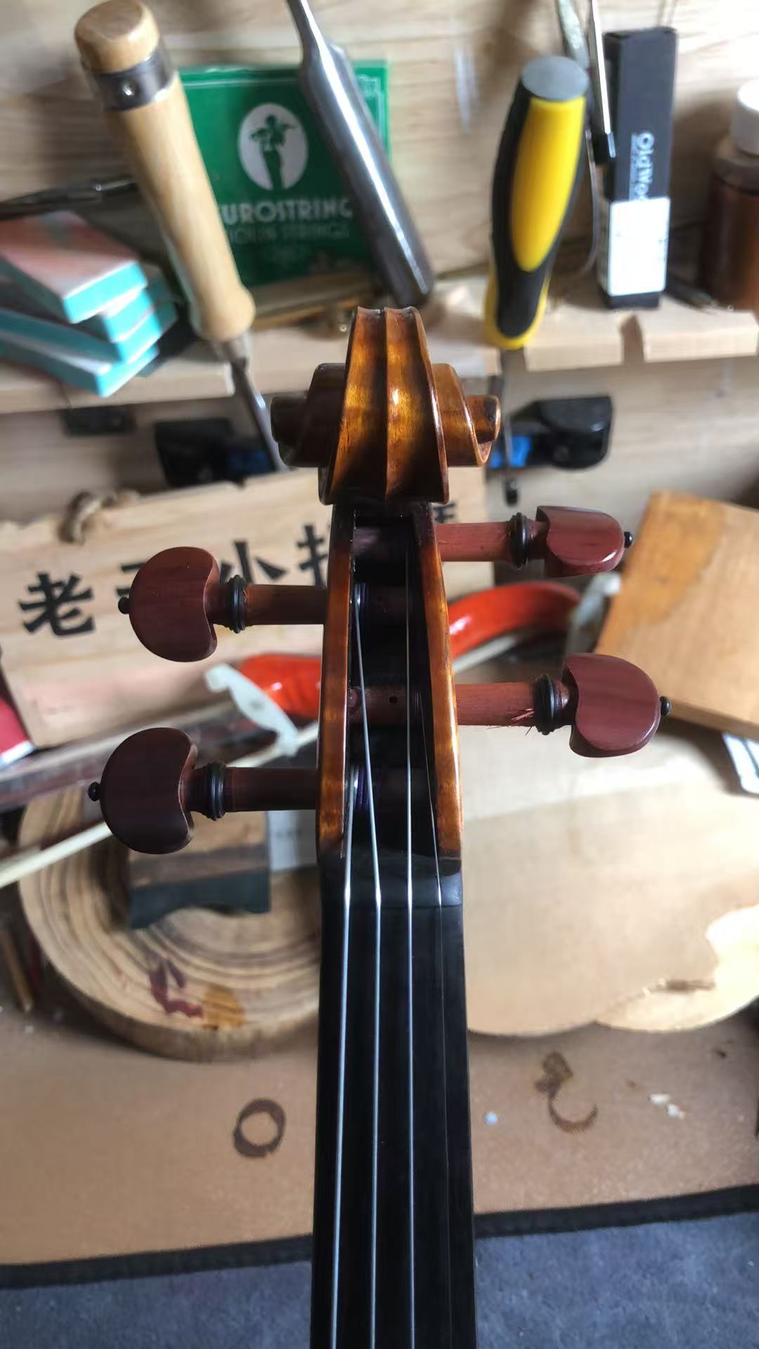 A finished violin, strung up and ready to be played
